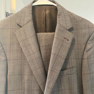 Gray plaid Joseph A Banks suit. Jacket 40r pants 34w. Brand new with tags